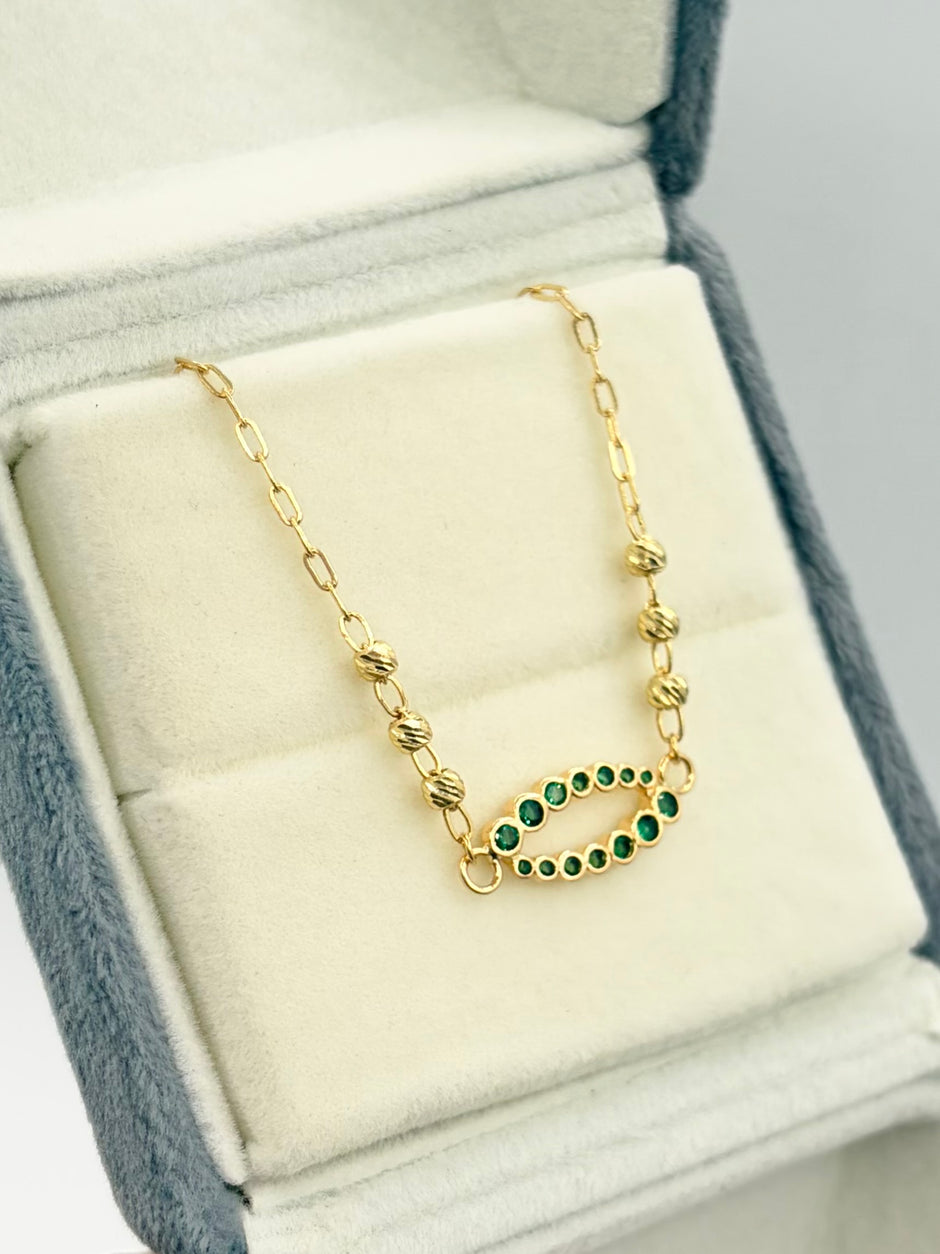 Pulso ovalo circones verdes con balines #3 Oro amarillo 18k 2,08 Gr / 1 mm / 19,1 Cm Broche 0,15