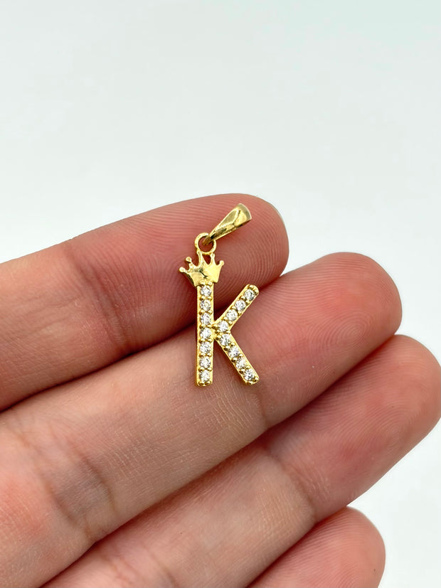 Dije Inicial K circones blancos corona  Oro amarillo 18k 0,93 Gr / 0,7 mm