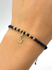 Pulsera tejida dije corona 6BD #3 piedras azules hilo azul Oro amarillo 18k 0,45 Gr
