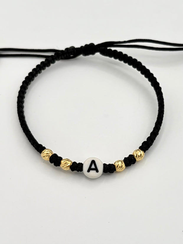 Pulsera tejida letra A 4BD #4 hilo negro Oro amarillo 18k 0,28 Gr