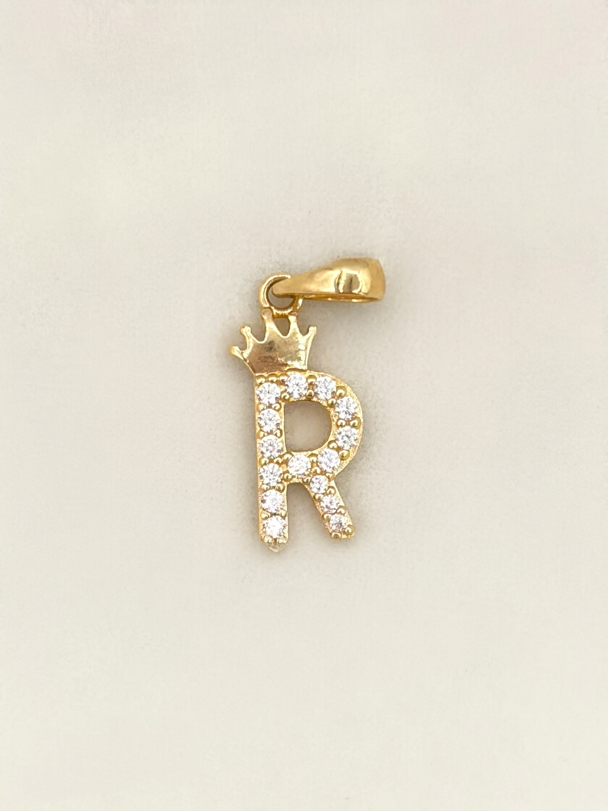 Dije Inicial R Oro amarillo 18k 0,83 Gr / 0,6 mm