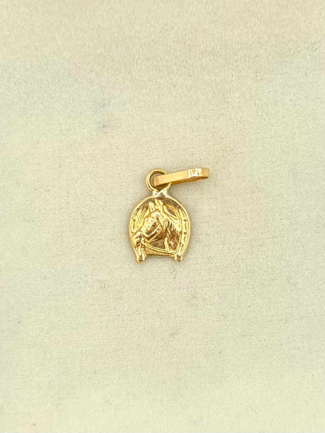 Dije Herradura de caballo Oro amarillo 18k 0,63 Gr / 9 mm