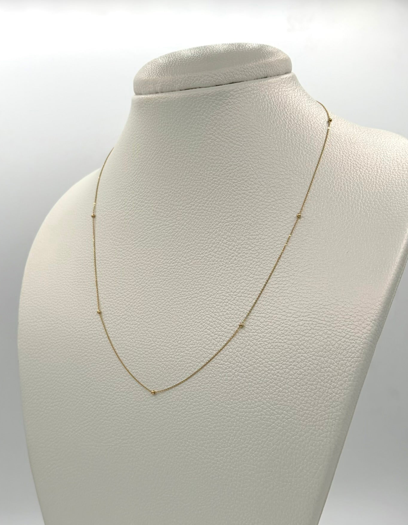 Cadena It aro seguido con balines lisos Oro amarillo 18k +1 / 1,30 Gr / 1,6 mm / 50 Cm