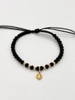 Pulsera tejida dije trebol dorado 6BD #3 hilo negro Oro amarillo 18k 0,65 Gr