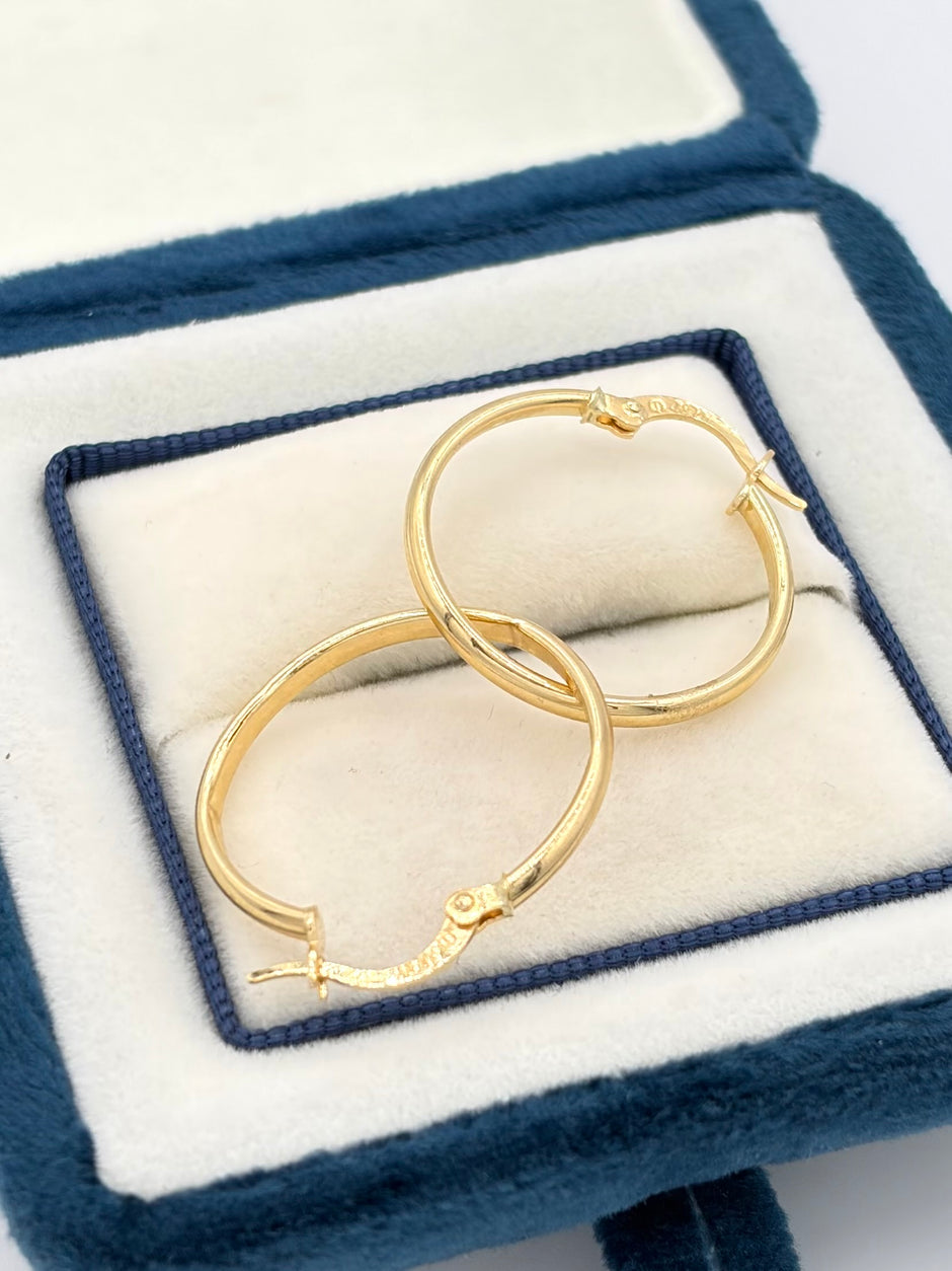 Candonga Redonda semi plana lisa Oro amarillo 18k 1,38 Gr / 2 Cm