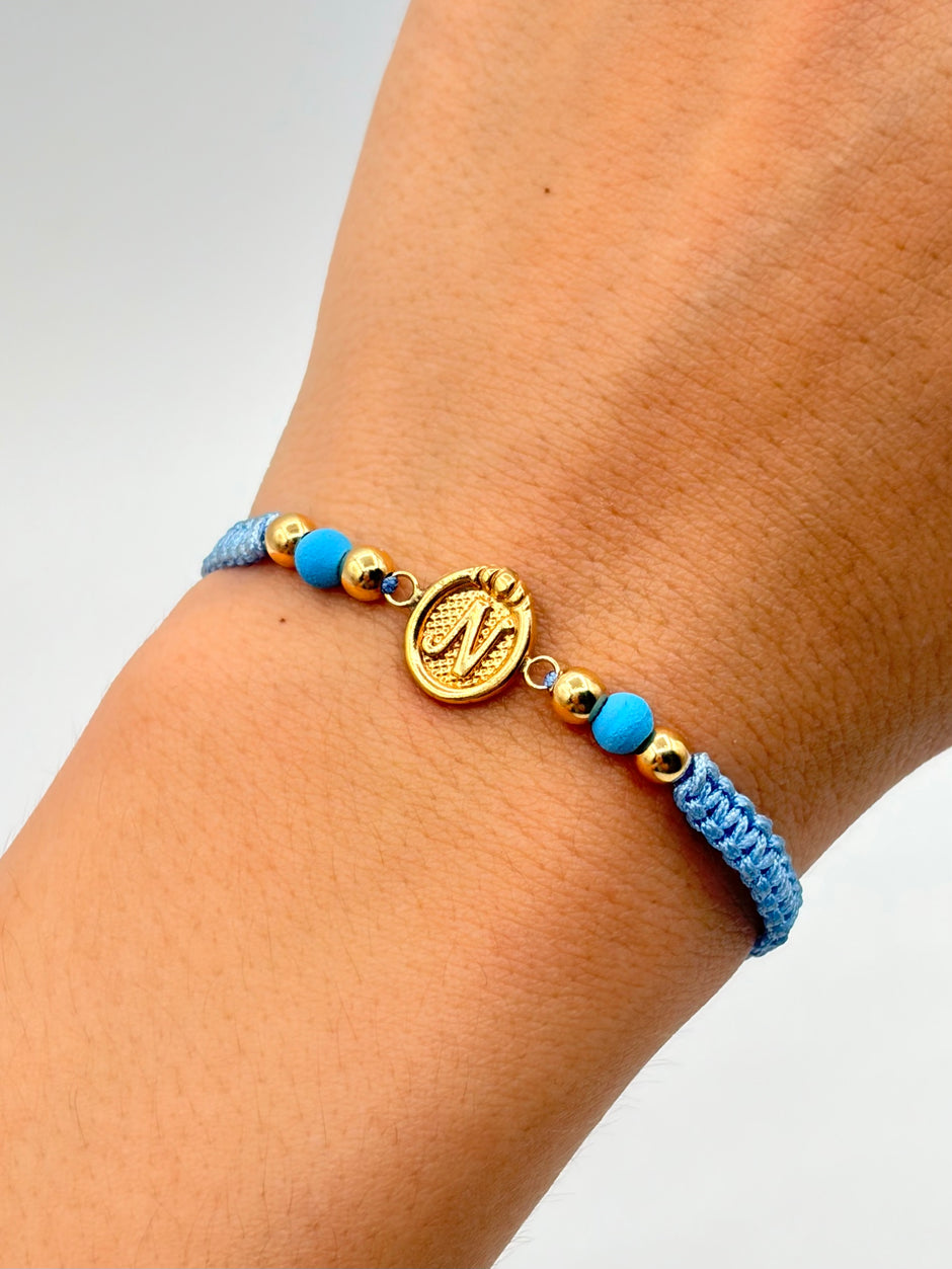 Pulsera tejida herraje N 4BL #4 hilo azul baby Oro amarillo 18k 0,75 Gr