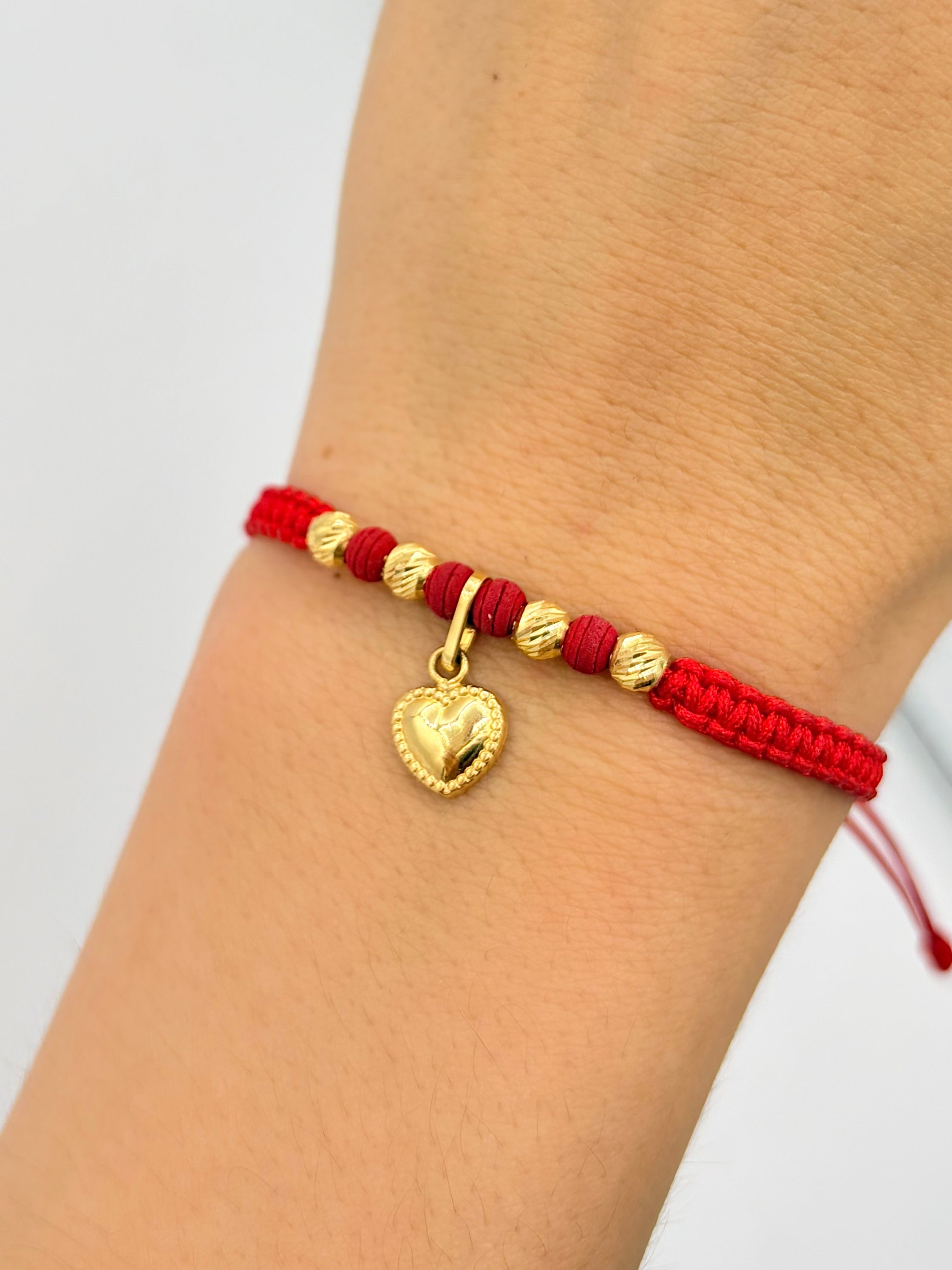 Pulsera tejida dije corazon 4BD #4 hilo rojo Oro amarillo 18k 0,60 Gr