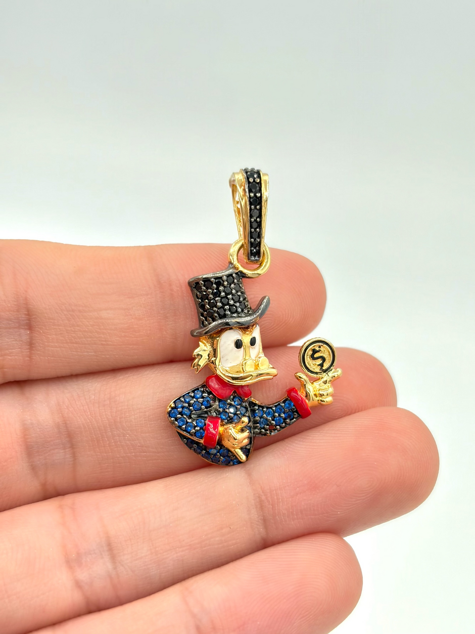 Dije tio rico circones Oro amarillo 18k 5,20 Gr / 2,5 Cm